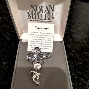 Nolan Miller Wildflower pin.
